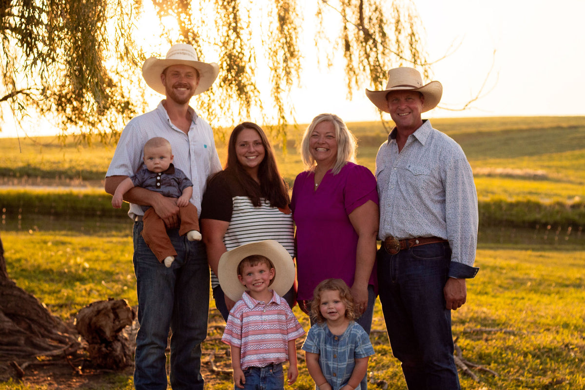 The Mundorf family outdoors at their Iowa farm